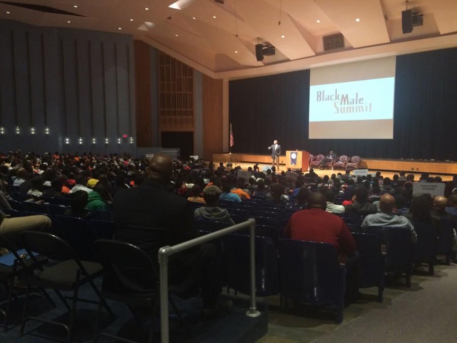 Motivational speaker Calvin Mackie speaks to Evanston Township High School students at the Black Male Summit. The event Friday aimed to connect students with resources in the Evanston community and ensure their future success.