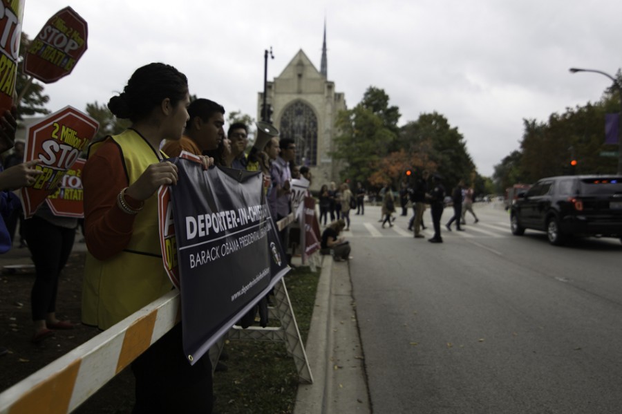 Students and community members line Sheridan Road in protest of Obama’s policies on immigration, fiscal reform and international affairs. Many different groups congregated by The Arch, including M.E.Ch.A de Northwestern and Turning Point USA. 