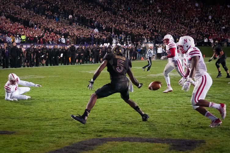 Junior receiver Miles Shuler can't hold on to a pass in the end zone. Shuler and the Wildcats were held scoreless in the second half, falling to NEbraska 38-17.