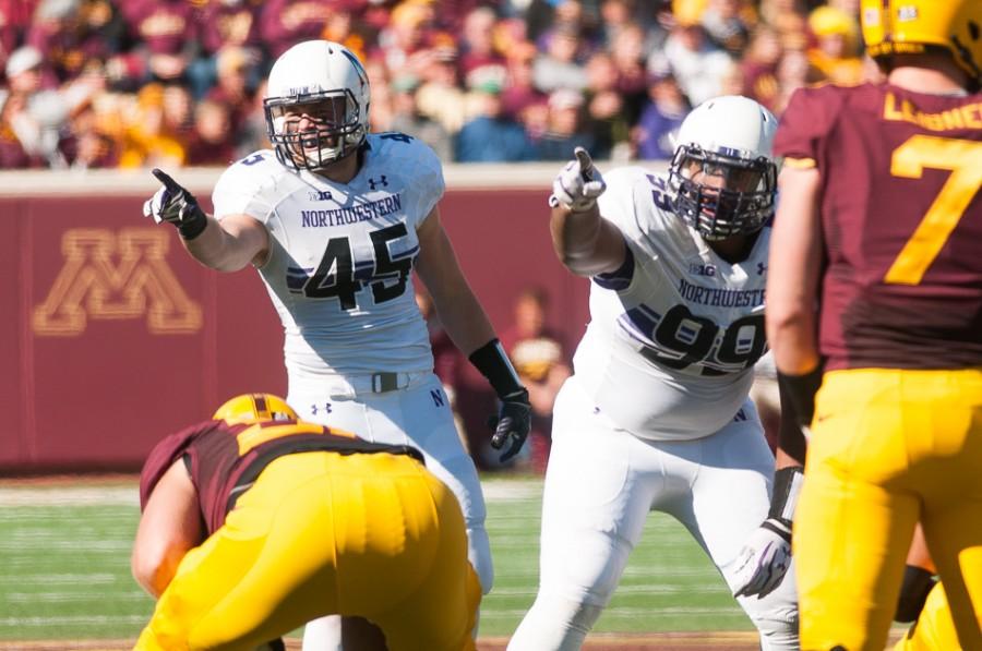 Senior linebacker Collin Ellis (45) played only four games this season as he battled multiple concussions. Coach Pat Fitzgerald announced Monday that Ellis will retire from football.