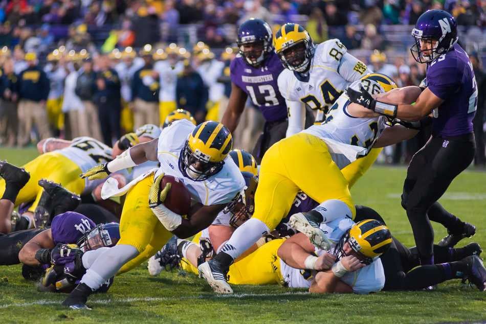 De'Veon Smith falls into the end zone for Michigan's only touchdown. The running back's score gave the Wolverines a lead they would not relinquish in an eventual 10-9 victory.