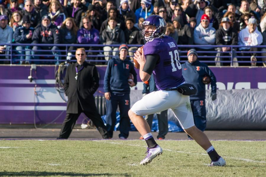 Junior quarterback Zack Oliver drops back to throw. Making his first career start, Oliver turned the ball over five times in Northwesterns 47-33 loss to Illinois.