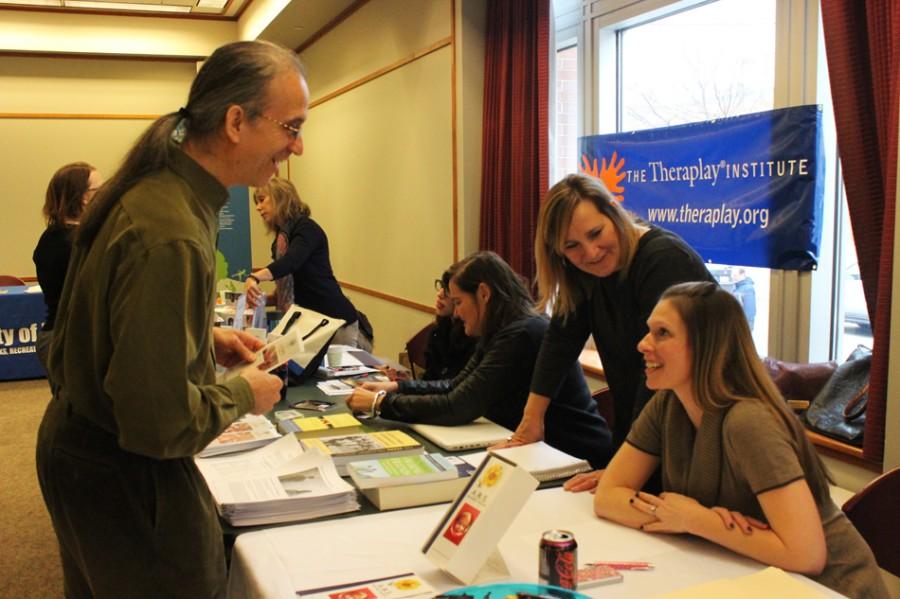 Companies speak to families with special needs about their services at the city’s first Special Needs Family Resource Fair. Through the event, the companies were able to provide information to community families and network with similar organizations.