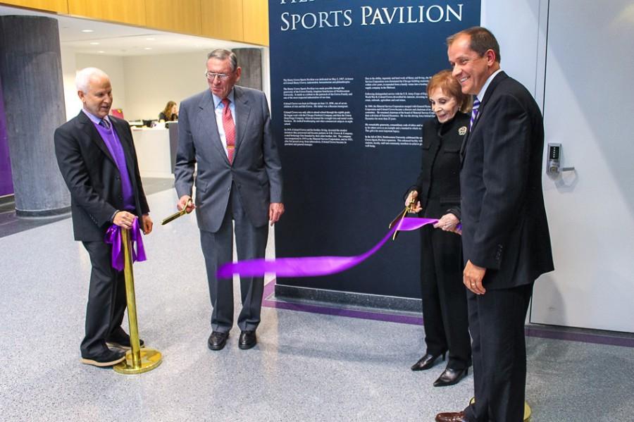 Lester+Crown+and+his+wife+Renee+Crown+%28center%29+cut+the+ribbon+for+the+newly+re-dedicated+Henry+Crown+Sports+Pavilion.+The+facility+reopened+this+fall+after+a+nearly+30%2C000-square-feet+expansion.