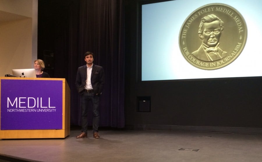 Journalist Matthieu Aikins accepts the James Foley Medill Medal for Courage in Journalism for his reporting in Afghanistan. Aikins and slain journalist James Foley were both awarded the medal this year for their work in war zones.