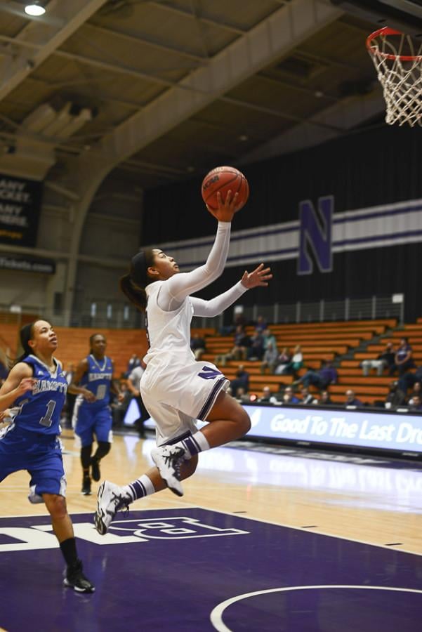 Ashley Deary shoots a lay-up. The sophomore guard was the leading cog in Northwestern’s robust offense against Michigan State, scoring 18 of the team’s 77 points.