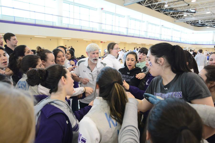 (Daily file photo by Sean Su) OUT OF REACH A Northwestern fencer, left, dodges a thrust from an opponent. The Wildcats had a strong performance this weekend but ultimately came up short against rival Ohio State.