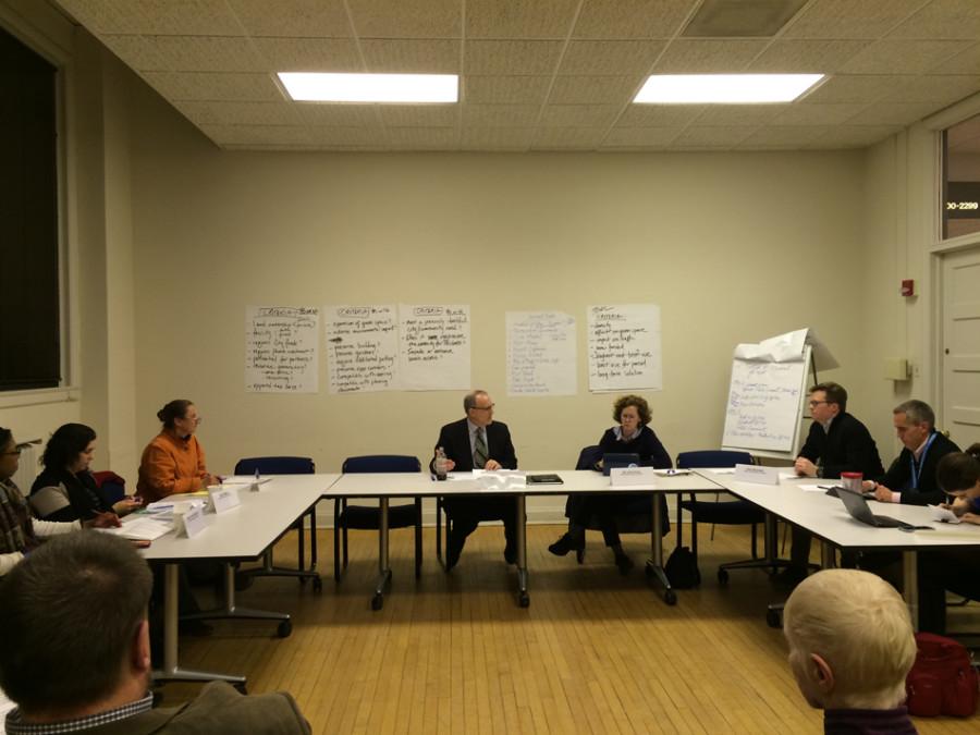 Members of the Harley Clarke Citizens Committee discuss a list of criteria they compiled at the meeting. The committee met to address ways to approach the future of the Harley Clarke Mansion.