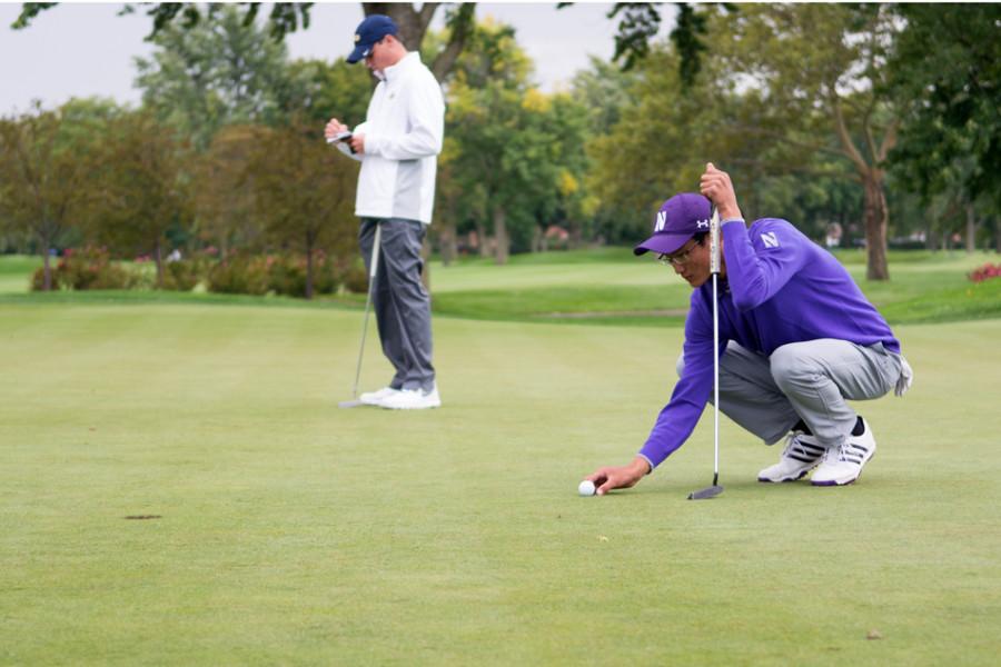 Charles Wang lines up a putt. The freshman produced a four-under 68 in the second round at the Jones Invitational, on his way to a four-way tie for 19th.