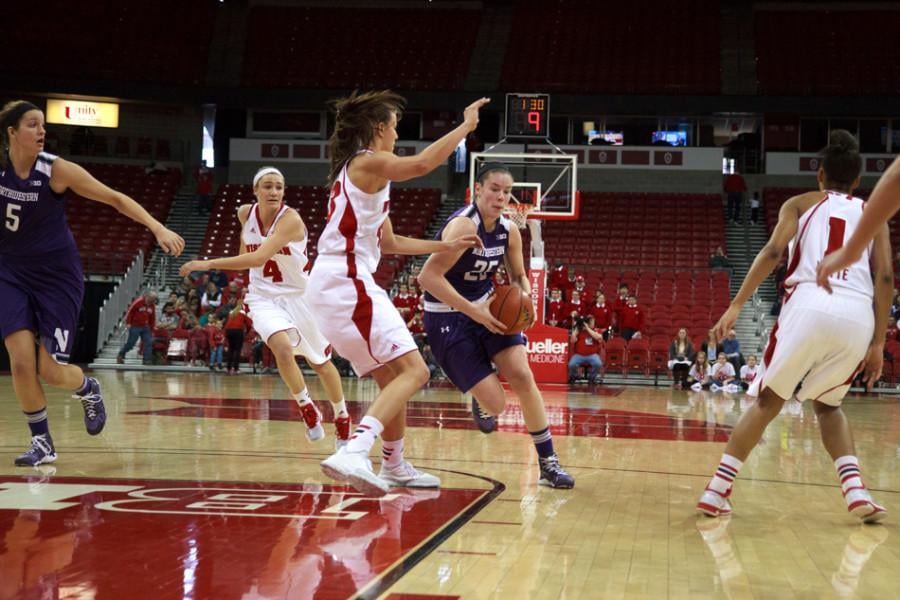 Maggie Lyon weaves her way down the lane. The junior guard scored 15 points in Sunday’s 86-83 overtime win, none more important than the 2 she produced with seconds left in regulation to tie the contest.