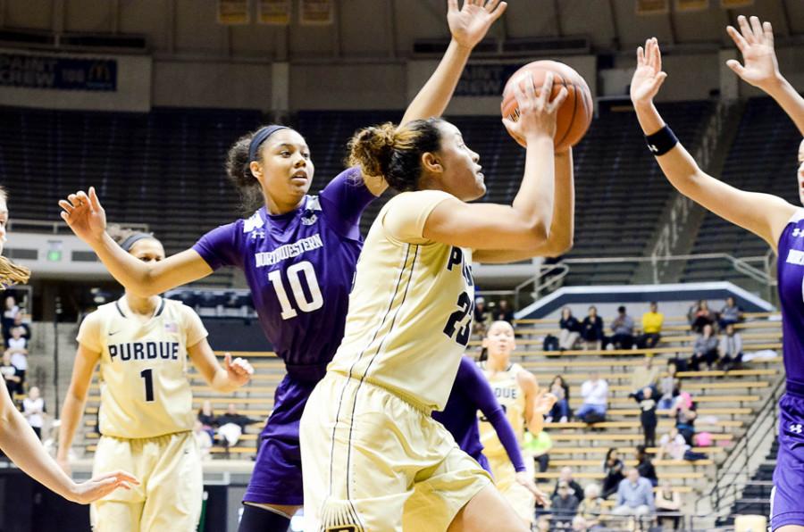 Nia Coffey moves into position. The sophomore forward did not miss from the free throw line on Wednesday night and settled into a key 17-point, 11-rebound performance in a Wildcats win.
