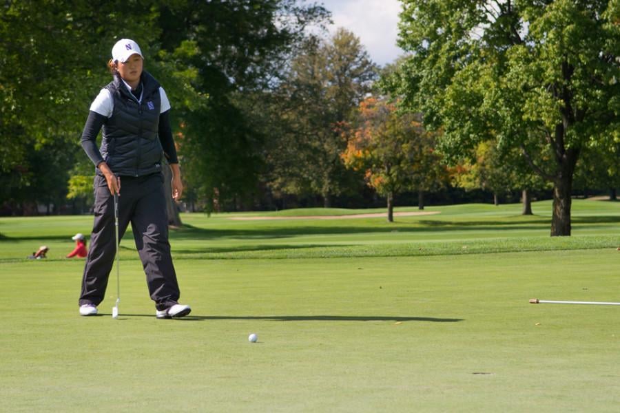 Sarah Cho eyes an angle for her putt. The freshman aided Northwestern’s efforts at the Liz Murphey Collegiate Classic.