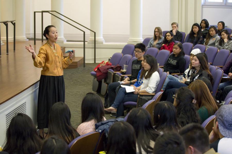 Prof. Ji-Yeon Yuh discusses the trend of the “Asian bubble,” which she related to the historic segregation of Asian-Americans in U.S. communities. The event, held at Harris Hall, attracted about 100 students.