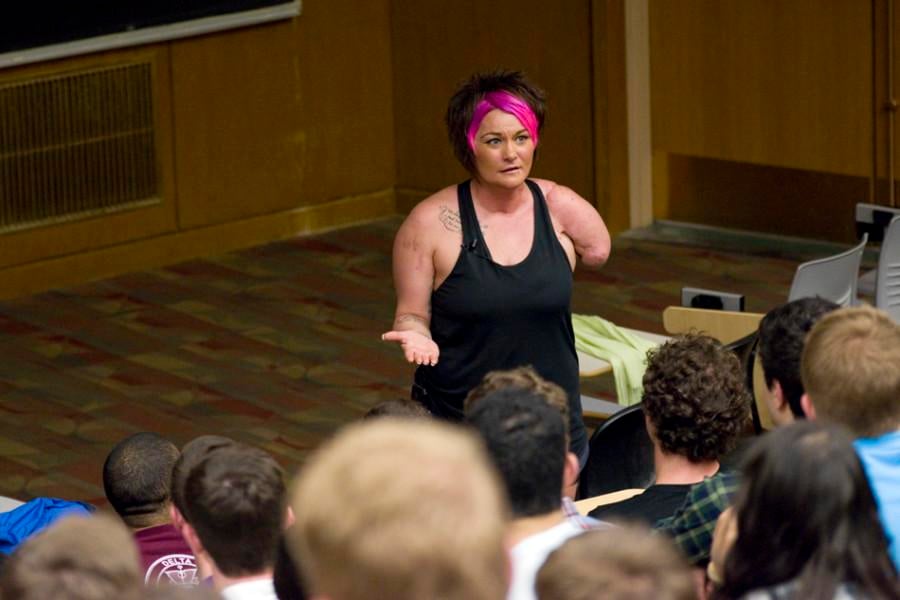 Sarah Panzau-Evans speaks to students at the Technological Institute on Thursday. Panzau-Evans, who lost most of her left arm in a drunk driving accident, urged students to make good decisions concerning drunken driving and to look out for their peers.