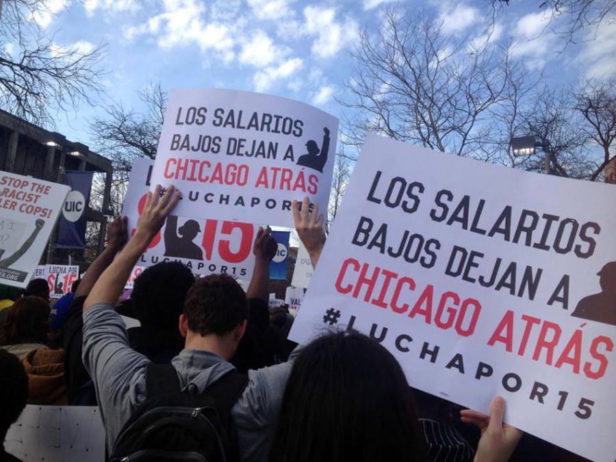 Students protest alongside Chicago workers and activists Wednesday. Around 30 Northwestern students joined the demonstrations, which were part of the national Fight for $15 campaign to raise the federal minimum wage from $7.25 to $15 an hour.