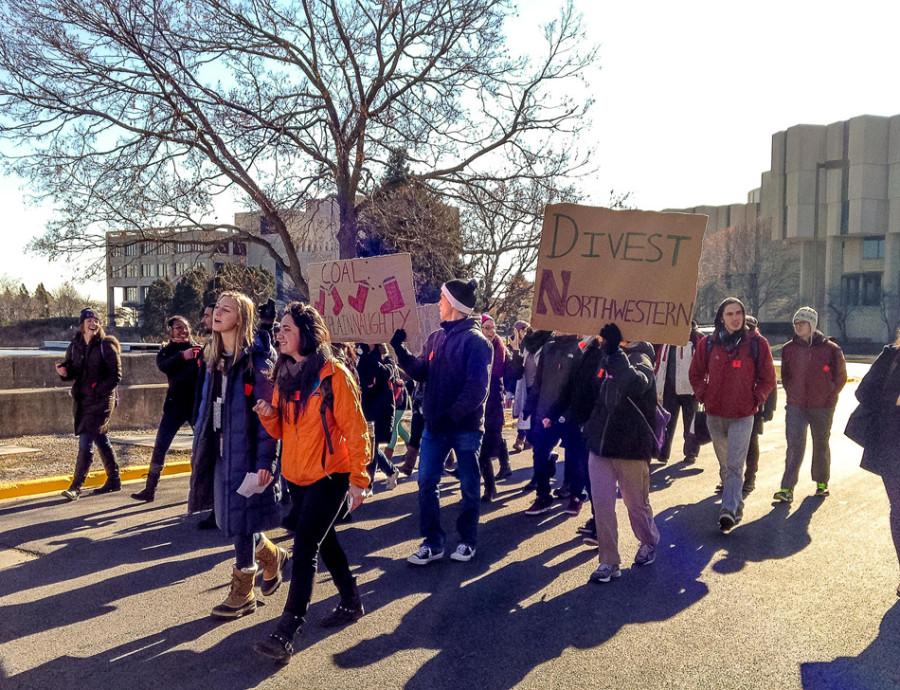 Students+march+to+a+Board+of+Trustees+meeting+in+November+to+ask+Northwestern+to+divest+its+endowment+funds+from+the+coal+industry.+Students+can+voice+their+opinions+on+coal+divestment+through+an+ASG+referendum+in+this+year%E2%80%99s+elections.