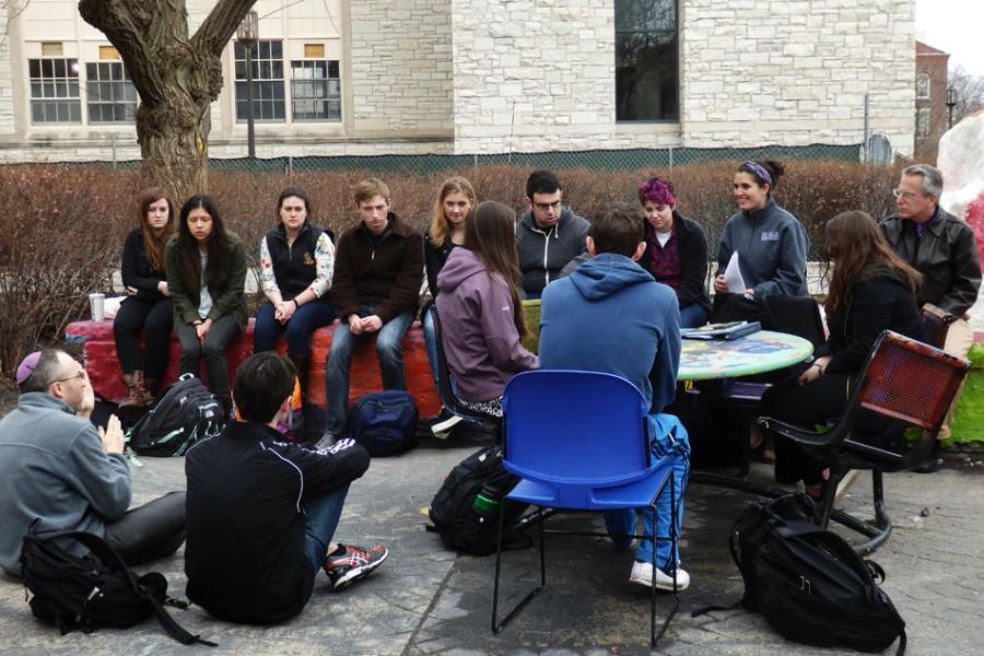 Students commemorate Holocaust victims at The Rock during this year’s Holocaust Remembrance Day. SESP Prof. Danny Cohen closed the day’s events with the presentation of his book “Train,” which narrates the stories of different groups marginalized by Nazis.