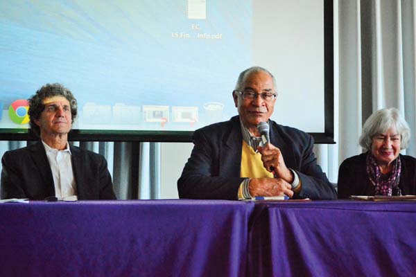 Activist Bennett Johnson discusses school integration at a panel sponsored by the Center for Civic Engagement. The event, held in Norris University Center, focused on the issue of discriminatory housing practices in the Chicago area during the 20th century.
