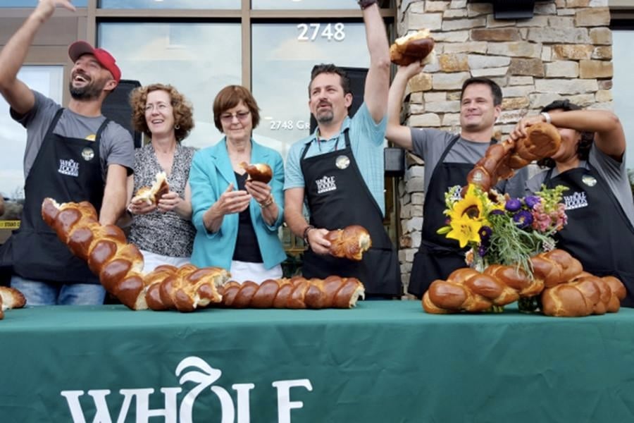 Ald. Jane Grover (7th) and Evanston Mayor Elizabeth Tisdahl attend the grand opening of the citys third Whole Foods store Wednesday.