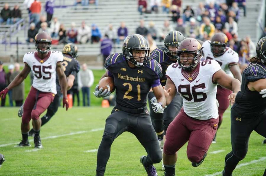 Sophomore running back Justin Jackson searches for room to run. The Cats will need a big-time performance from the nation’s No. 10 rusher as they take on the No. 5 rushing defense in the country in Ann Arbor on Saturday.
