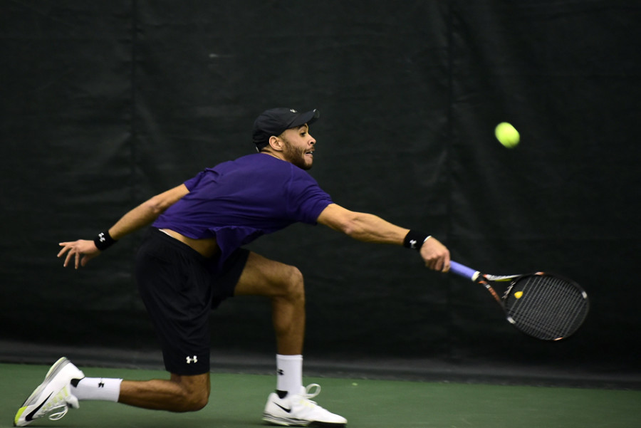 Sam Shropshire lunges to return a ball. The junior didn’t play his best at the ITA Midwest Regional Championships and was bounced in the second round.