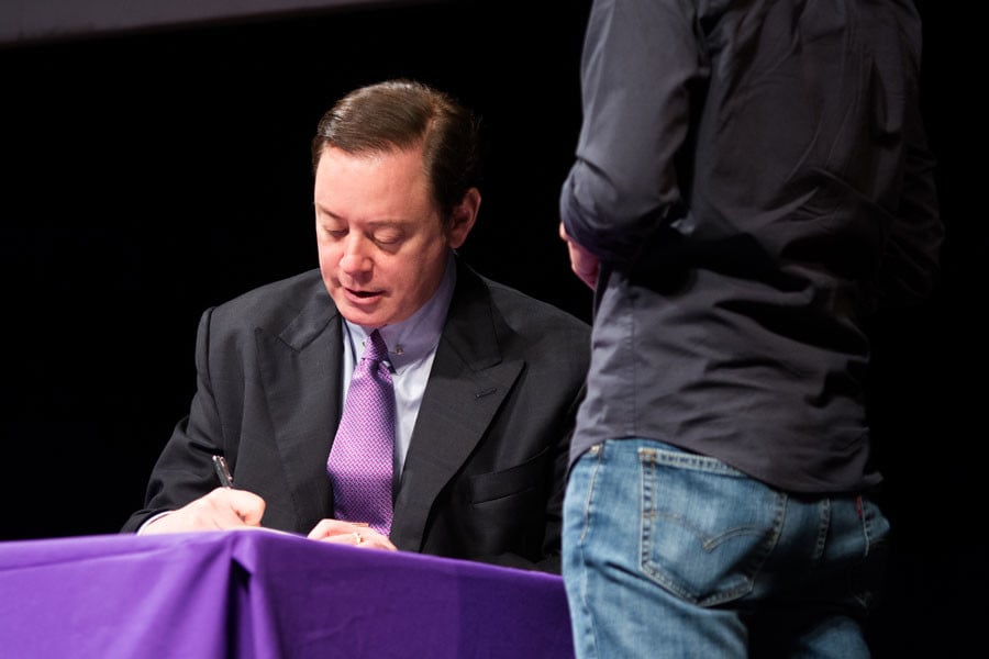 Author Andrew Solomon signs copies of his book “Far from the Tree: Parents, Children, and the Search for Identity” for audience members following a talk in Cahn Auditorium. Solomon, a bestselling author, spoke about issues of identity in families of children with disabilities.