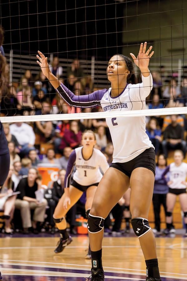 Symone Abbott waits for the ball to be served. The sophomore outside hitter totaled 19 kills this weekend for the Cats but was unable to help lift NU to a victory in either contest.