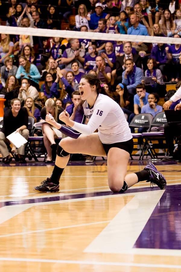 Junior outside hitter Sophia Lavin screams in celebration. Lavin notched 10 kills for the Cats, including the final one of the game, in their upset of No. 3 Penn State.