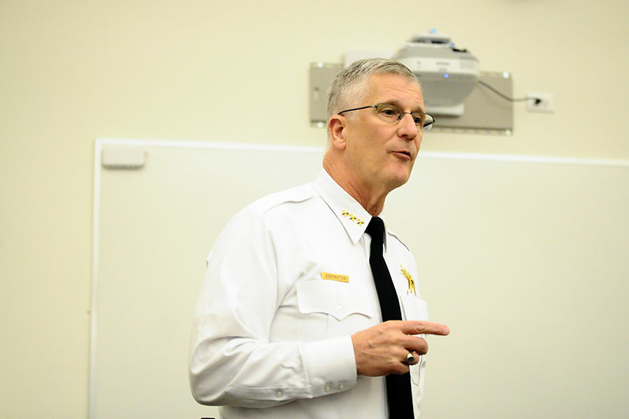 Evanston Police Chief Richard Eddington speaks to community members Thursday about a shots-fired incident near Evanston Township High School the previous day. Eddington said the incident should not be a cause for alarm for residents and spoke along with aldermen about ongoing community efforts to decrease violence.  
