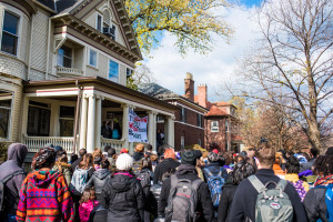 Students gather outside the Black House on Nov. 13 to protest institutional racism at Northwestern and other universities. Students released an official list of demands to the University on Friday to enhance the experiences of students of color at NU. 