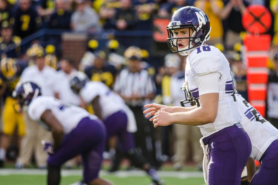 Clayton Thorson looks back at the sideline as the offense waits to snap the ball. The redshirt freshman quarterback will have to deal with a loud crowd on the road in Wisconsin, similar to the ones at Michigan and Nebraska.