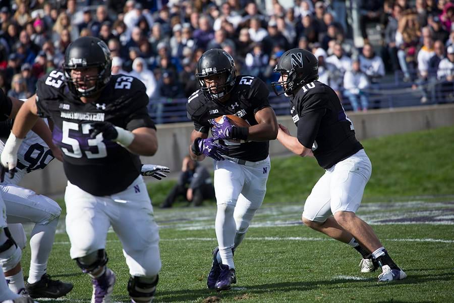 Justin Jackson takes a handoff during the first half of Saturdays game against Penn State. Jackson rushed for a career-high 186 yards on the ground in the 23-21 win.