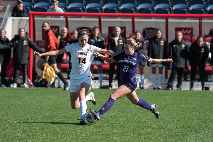 Addie Steiner fights for possession of the ball. The junior forward finished the season as the team leader in both goals and assists, with seven of each.