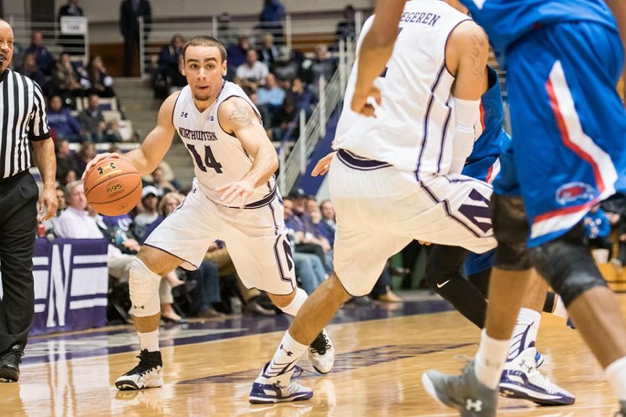 Photo caption: Tre Demps drives towards the basket. The senior guard was instrumental in Northwesterns victory over Nebraska Wednesday, scoring 17 points in 36 minutes.