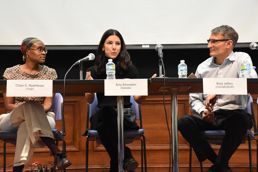 Amy Silverstein of Deloitte discusses the impact of choosing fair trade products to combat human trafficking during a panel organized by student group Fight for Freedom. The panel emphasized the role of business and consumer responsibility in ethical labor practices.