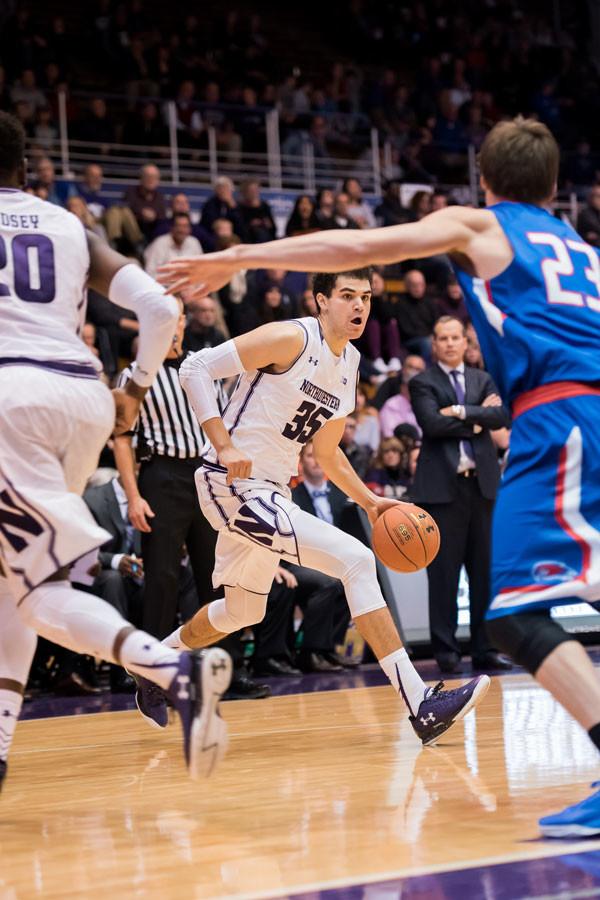Aaron Falzon prepares to dribble to the paint. The freshman forward set a career high with six 3-pointers in Saturdays win over Minnesota. 