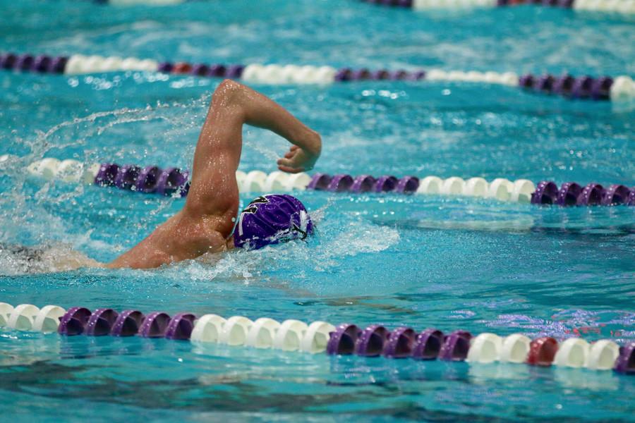 Carter Page swims in this weekend’s meet. The freshman distance specialist won the 500-yard freestyle in 4:33.60.
