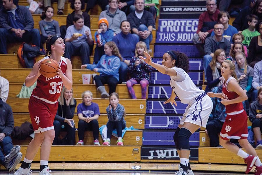 Nia Coffey defends an Indiana ballhandler. The junior forward scored 29 points in Sunday’s loss to Indiana, Northwestern’s third-straight defeat.