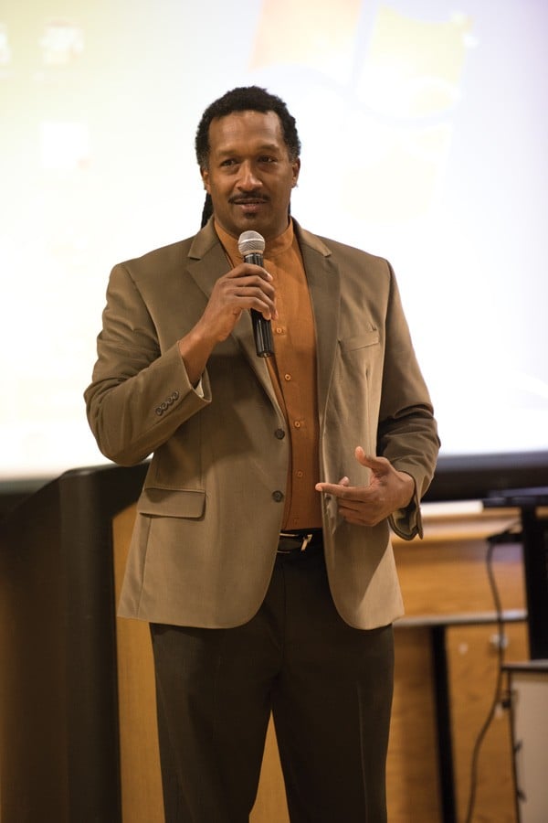 Dr. Gilo Kwesi Logan leads a discussion about diversity and inclusion efforts from the Evanston Police Department at the Levy Center, 300 Dodge Ave., on Tuesday night. More than 50 residents, officers and city officials attended the event.