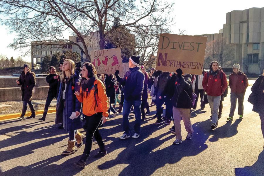 Students+protest+Northwestern%E2%80%99s+investments+in+the+coal+industry+in+2014.+Members+of+Fossil+Free+Northwestern%2C+the+group+pushing+for+divestment+from+coal%2C+oil+and+gas+companies%2C+have+been+fighting+against+the+University%E2%80%99s+investment+in+the+fossil+fuel+industry+for+years.