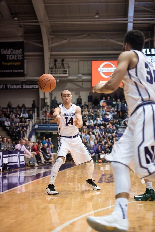 Tre Demps passes the ball. The senior guard is one game away from matching his career-best streak of consecutive double-digit scoring games.