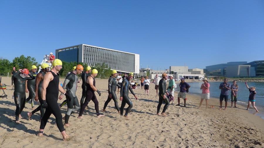 Swimmers prepare for the inaugural Great Lake Plunge last year at Clark Street Beach, 1811 Sheridan Rd. This year’s open water swim will instead take place half a mile south at Greenwood Street Beach, 1401 Sheridan Rd.