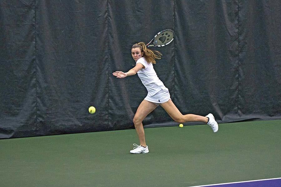 Erin Larner runs to the ball. The sophomore won both of her matches against Vanderbilt, but the team was unable to come away with the win.