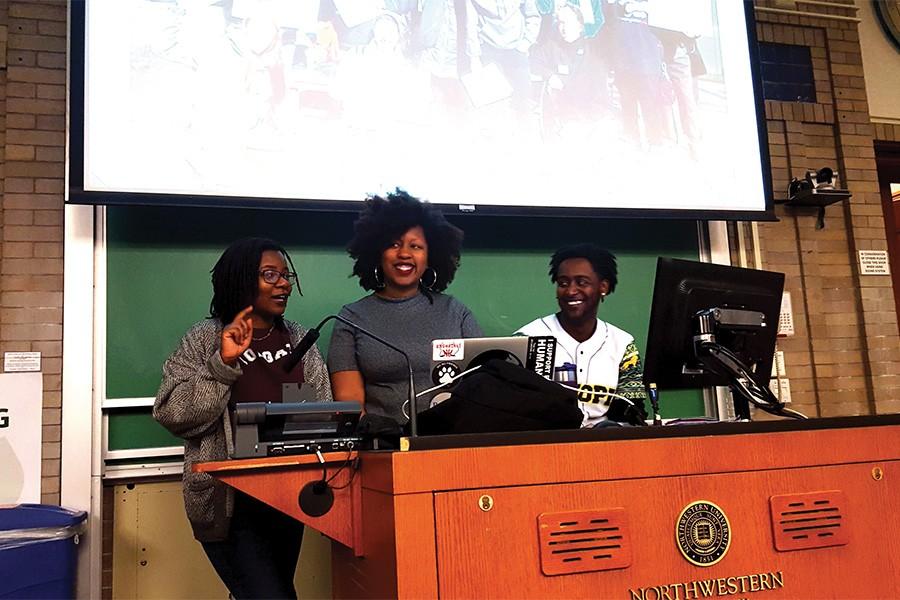 Sarayah Wright (left), Michelle Sanders (middle) and Robel Worku (right) lead a presentation about the importance of voting for the black community. The event, Black Votes Matter, was co-hosted by Black Lives Matter NU and Illinois and Indiana Regional Organizing Network Students of Northwestern United.