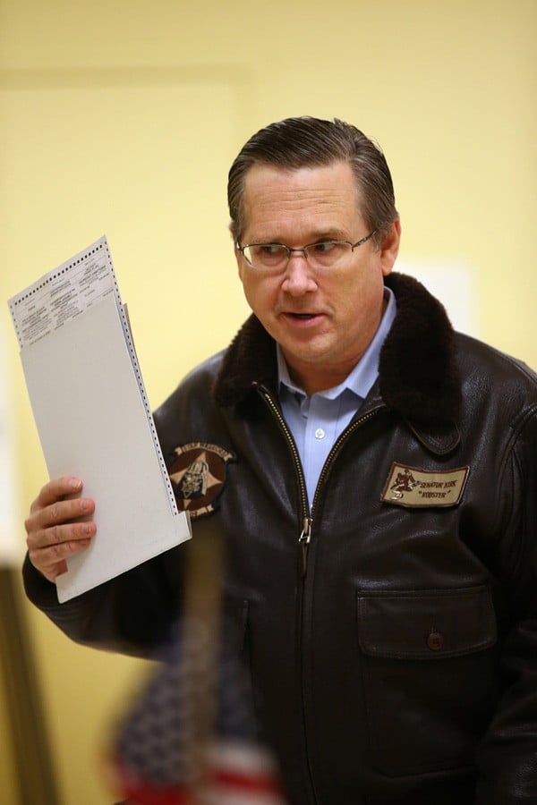 U.S. Sen Mark Kirk receives a ballot to vote Tuesday, March 15, 2016, at a Highwood, Ill., recreation center. Kirk was the first GOP senator to meet President Obama’s Supreme Court nominee. 