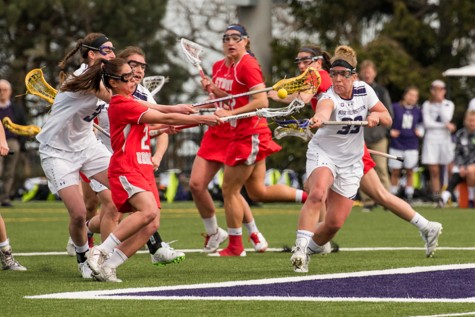 Shelby Fredericks fights with an opposing player for the ball. The sophomore scored four goals over Northwestern’s last two games.