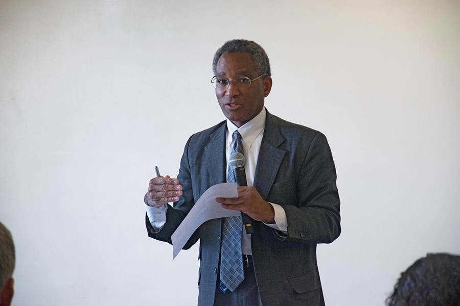 Philip Harris, Northwestern’s vice president and general counsel, talks about the naming of spaces on campus during the third community dialogue held in Norris University Center. The event was part of a four-part series of discussions aimed at making NU a more inclusive community. 