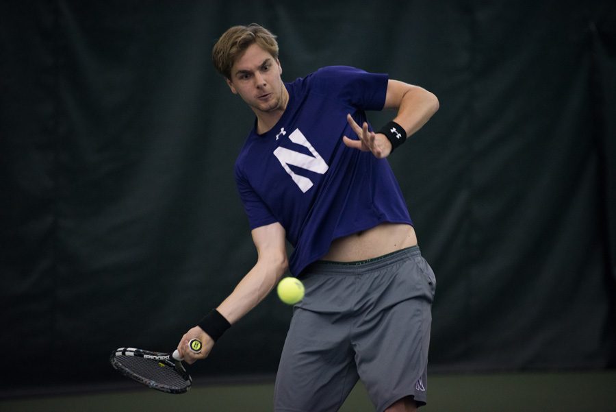 Fedor Baev prepares to smash a forehand. Baev, along with fellow senior Mihir Kumar, will be celebrating their careers this weekend on Senior Day. 