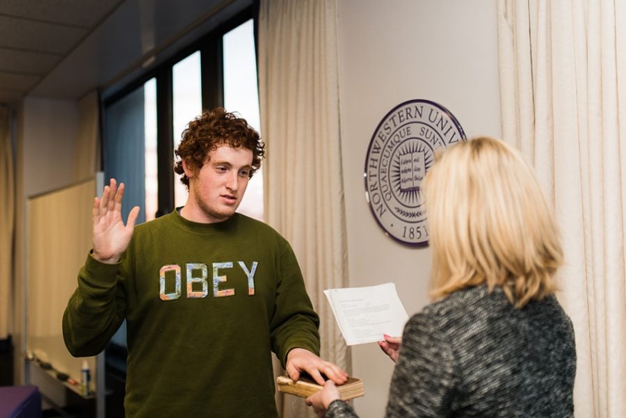 Weinberg senior Noah Star is sworn in as Associated Student Government president in April 2015. Stars term ends Wednesday evening, when SESP junior Christina Cilento will be sworn in.