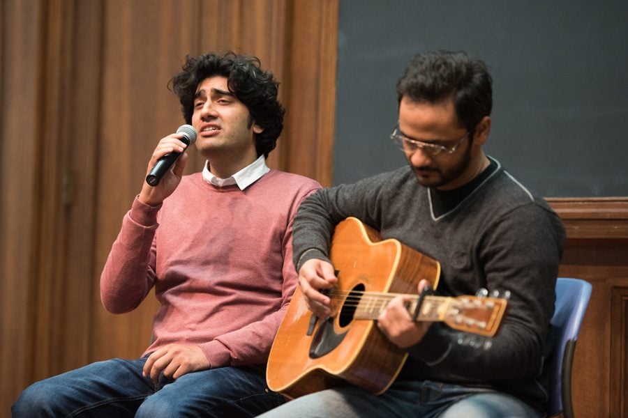 Pakistani pop stars Ali Aftab Saeed, left, and Saad Sultan, right, sing in an impromptu music concert Monday night. The artists arrived at Northwestern this week to begin a two-week residency as Jean Gimbel Lane Distinguished artists.